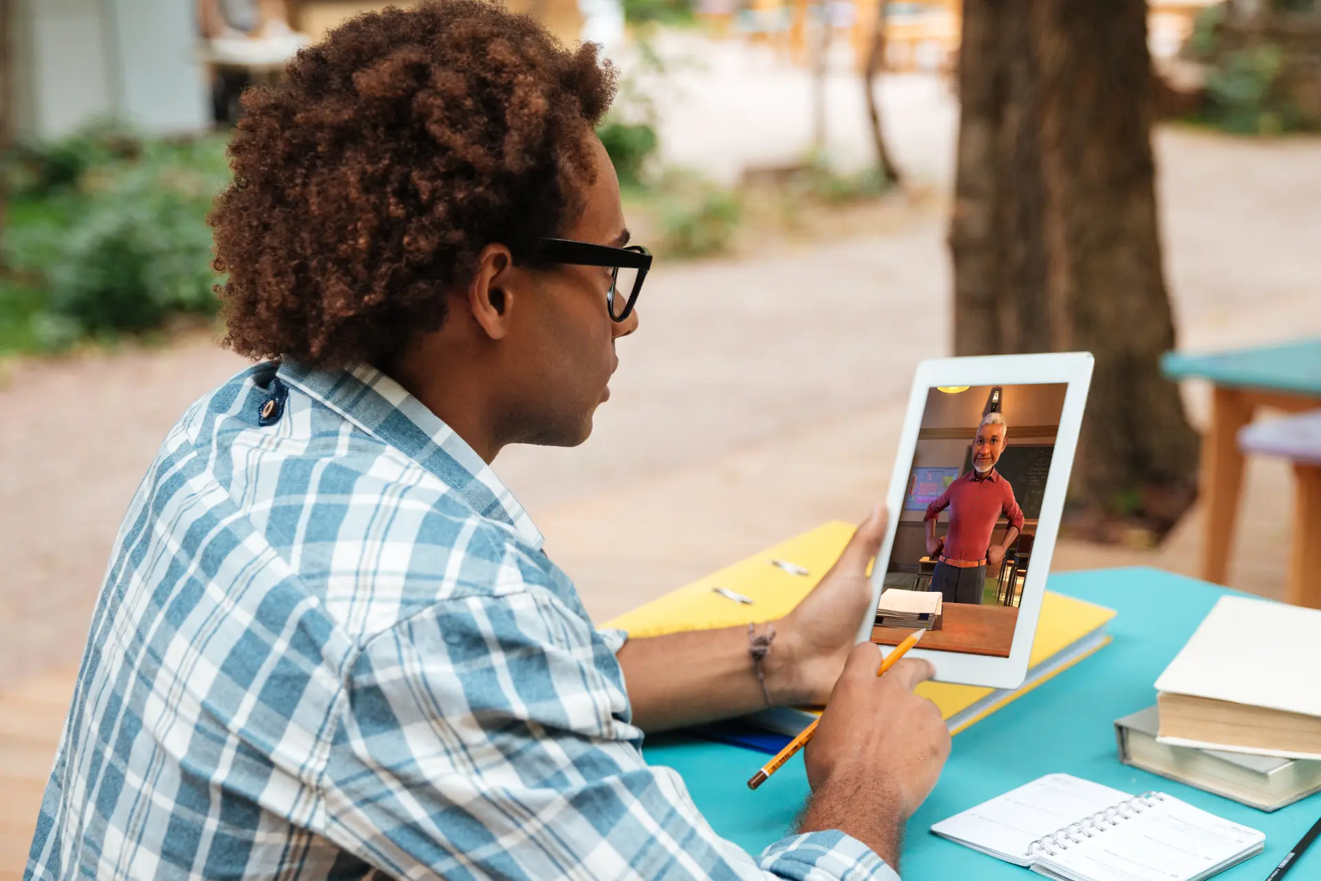 An older student interacting one-on-one with an interactive Teaching Assistant on a tablet